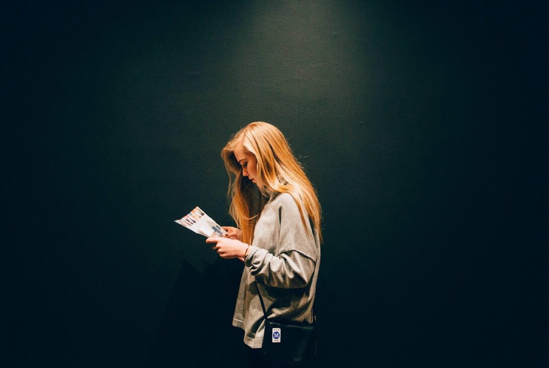 adult, dark, fashion, girl, light, magazine, person, reading, sweater, woman, black fashion, black light, black reading, black dark, black lights, magazine, reading, reading, reading, reading, reading